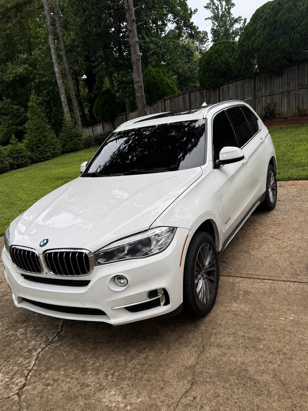 Michael Franji's white BMW X5 with window tint by The Tint Shop, Marietta GA